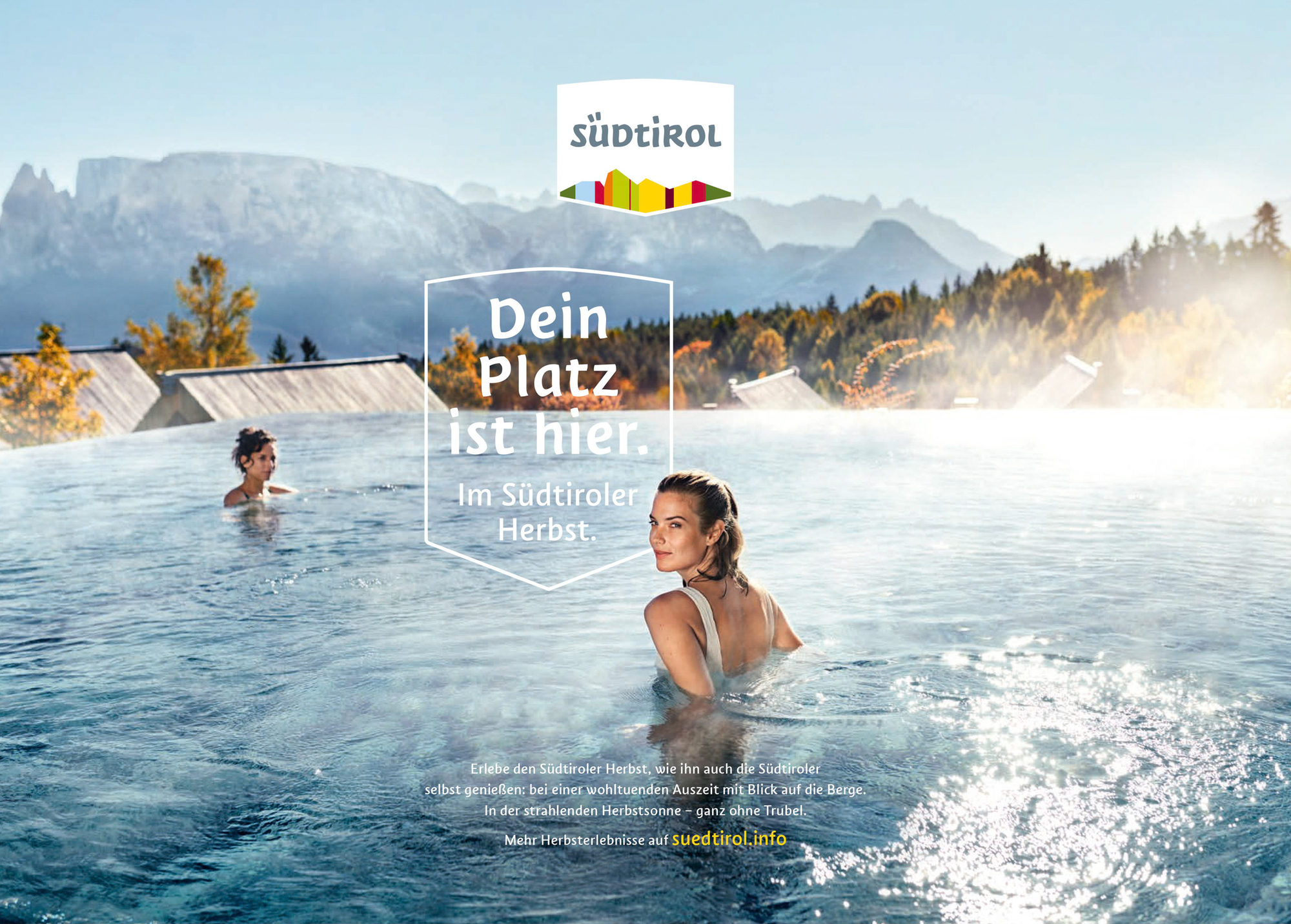 woman takes a relaxing bath in the pool; alpine view; South Tyrol tourism campaign