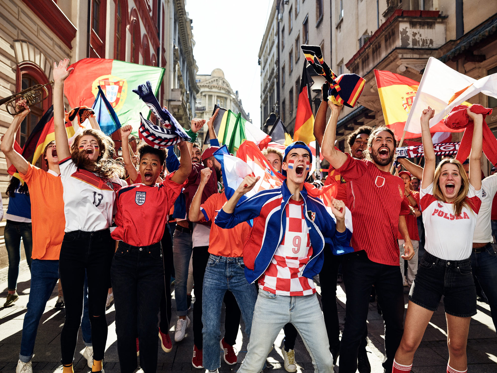 Football fans celebrating together in the street for ZDF UEFA Euro 2020
