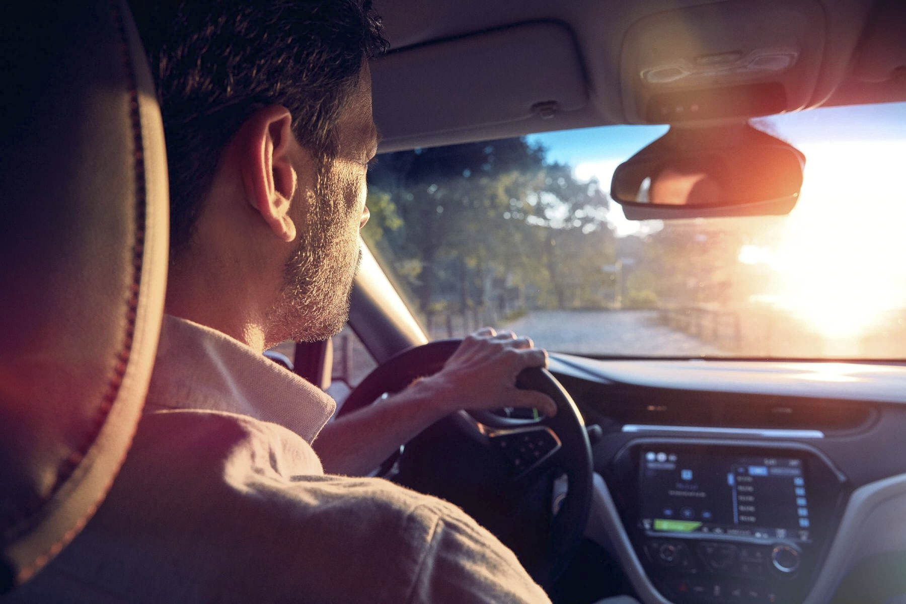 close-up shot of aDriver inside an electric car during a Webasto eMobility campaign